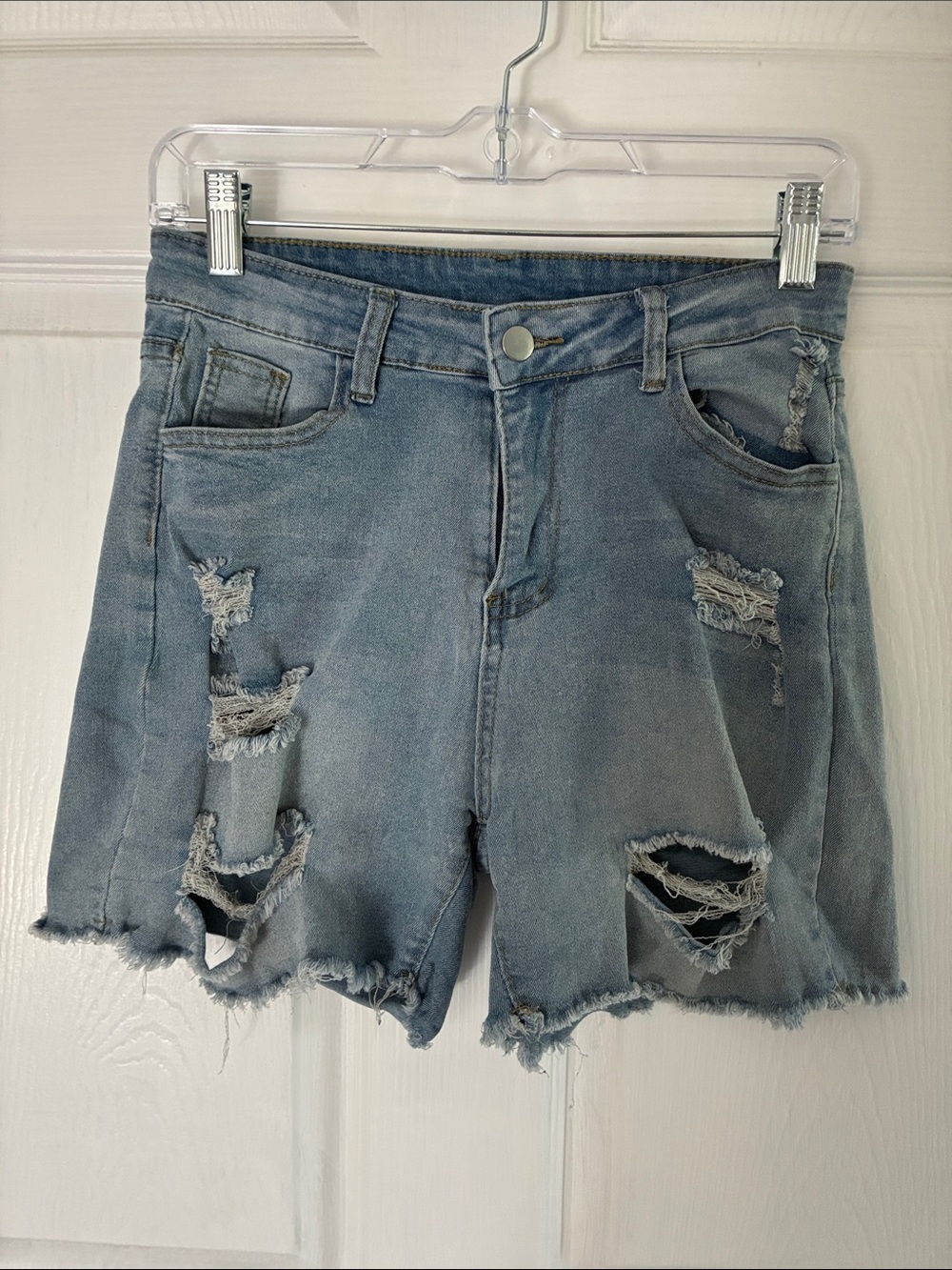 Stretch light Blue Distressed Denim Women's Shorts. Size 9/10